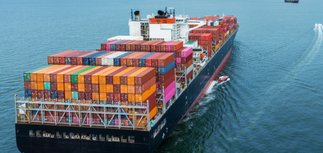 Loaded container ship under way at sea, seen from above